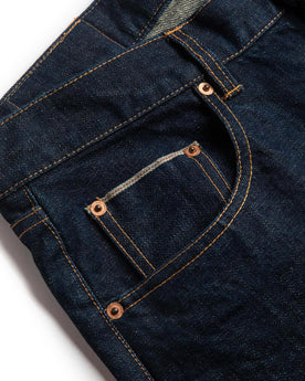 material shot of right pocket of The Democratic Jean in Rinsed Organic Selvage, Bottoms by Taylor Stitch