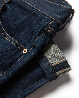 material shot of selvage hem of hem The Democratic Jean in Rinsed Organic Selvage, Bottoms by Taylor Stitch