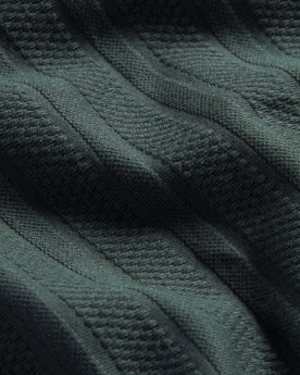 material shot of body fabric of The Polo in Dark Slate Jacquard, Knits by Taylor Stitch