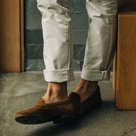 Fit model wearing loafers with The Slim Foundation Pant in Organic Stone
