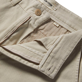 material shot with open zipper fly of The Slim Foundation Pant in Organic Stone