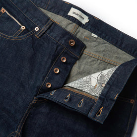 material shot of open front placket of The Slim Jean in Rinsed Organic Selvage