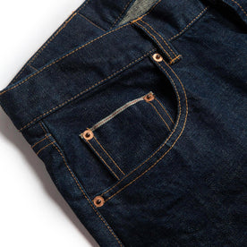 material shot of right side pocket of The Slim Jean in Rinsed Organic Selvage