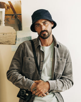 fit model wearing The Bucket Hat in Washed Navy Twill, Accessories by Taylor Stitch