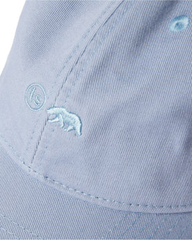 material shot of the logo on The Everyday Cap in Washed Blue Twill, Accessories by Taylor Stitch