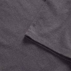 material shot of the sleeve on The Heavy Bag Tee in Smoke