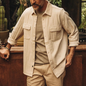 fit model standing in The Ledge Shirt in Oyster Herringbone