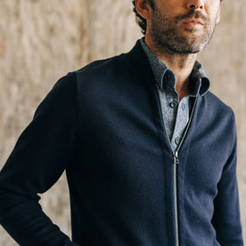 fit model showing the front YKK zipper on The Portola Bomber in Midnight Merino