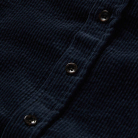 material shot of the buttons and texture on The Utility Shirt in Dark Navy Crepe Cord