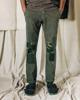 material shot of The Atelier and Repairs Chino in Olive, cuffed on model, Bottoms by Taylor Stitch