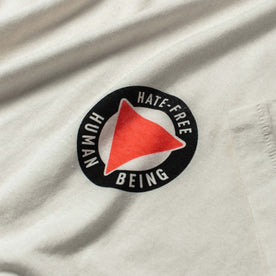 material shot of close-up of the graphic logo on The Cotton Hemp Tee in Hate-Free