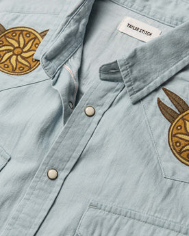 material shot of the front yokes and buttons on The Embroidered Western Shirt in Washed Selvage, Wovens by Taylor Stitch