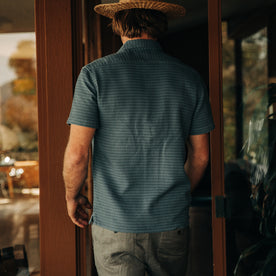 fit model showing the back of The Short Sleeve Hawthorne in Ocean Pickstitch Waffle