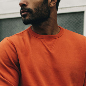 fit model wearing The Fillmore Crewneck in Rust