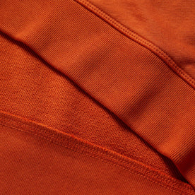 material shot of the ribbed ends on The Fillmore Crewneck in Rust