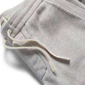 material shot of the drawstring and ribbed waist on The Fillmore Pant in Heather Grey