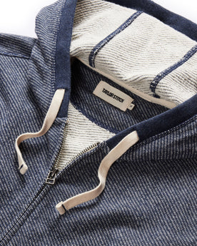 material shot of the drawcords and hood of The Apres Zip Hoodie in Heather Navy Terry, Knits by Taylor Stitch