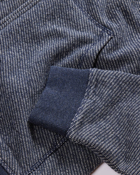 material shot of the ribbed cuffs on The Apres Zip Hoodie in Heather Navy Terry, Knits by Taylor Stitch