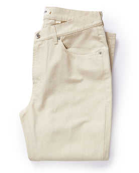 flatlay of The Slim All Day Pant in Dune Canvas, Bottoms by Taylor Stitch