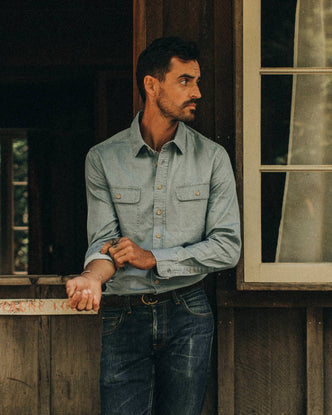 fit model wearing The Ledge Shirt in Sun Bleached Chambray, looking right