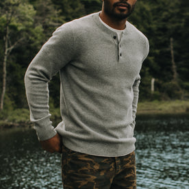 fit model posing in The Hudson Sweater in Heather Grey