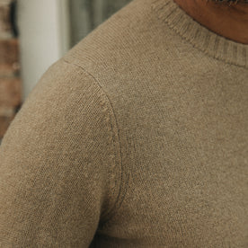 fit model showing sleeve detail on The Lodge Sweater in Camel