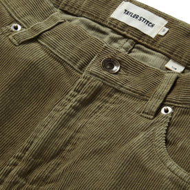 material shot of the button closure on The Slim All Day Pant in Cypress Cord