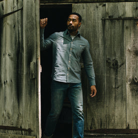 fit model posing in The Utility Shirt in Rinsed Selvage Chambray