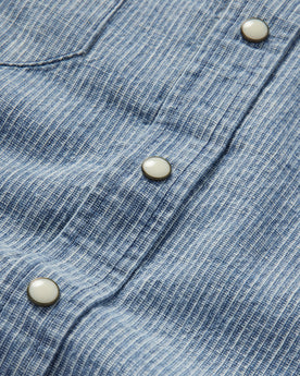 material shot of the buttons on The Western Shirt in Indigo Stripe, Wovens by Taylor Stitch