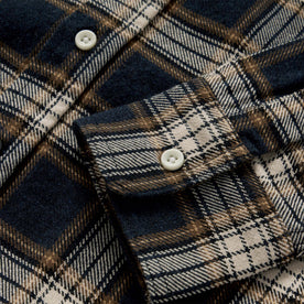 material shot of the sleeve on The Ledge Shirt in Admiral Plaid