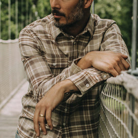 fit model posing in The Ledge Shirt in Fossil Plaid