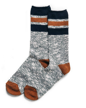 flatlay of The Camp Sock in Heather Olive, Accessories by Taylor Stitch