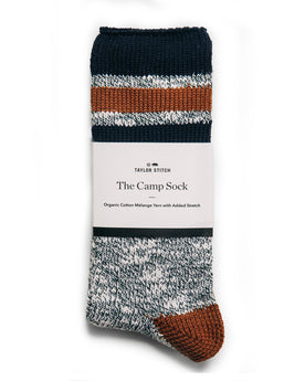 editorial image of the wrapping of The Camp Sock in Heather Olive, Accessories by Taylor Stitch