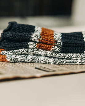 material shot of The Camp Sock in Heather Olive folded, Accessories by Taylor Stitch
