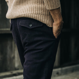 fit model showing off back pockets on The Carnegie Pant in Espresso Wool