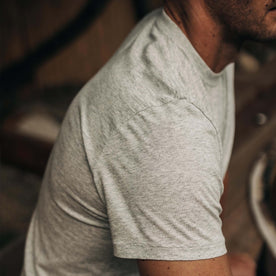 fit model showing off shoulder detail on The Cotton Hemp Tee in Heather Grey