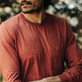 fit model with his arms crossed  The Cotton Hemp Long Sleeve in Engine