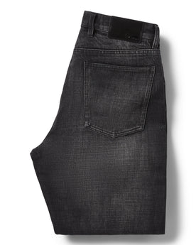 flatlay of the back of The Democratic Jean in Black 3-Month Wash Selvage, Bottoms by Taylor Stitch