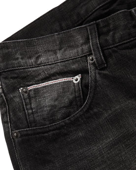 material shot of selvage 5th pocket on The Democratic Jean in Black 3-Month Wash Selvage, Bottoms by Taylor Stitch
