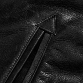 material shot of the pocket of The Moto Jacket in Black Steerhide