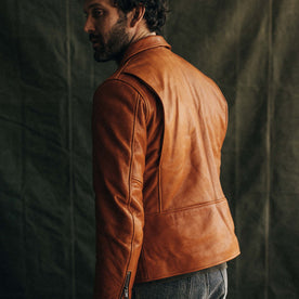 fit model showing the back of The Moto Jacket in Whiskey Steerhide