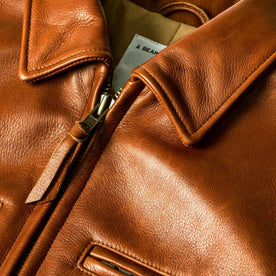 material shot of the zipper on The Moto Jacket in Whiskey Steerhide