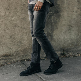 fit model walking in The Slim Jean in Black 3-Month Wash Selvage