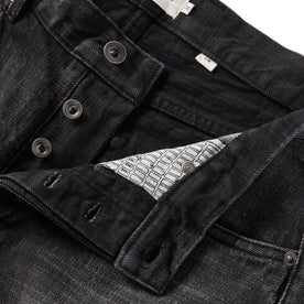 material shot of the button fly on The Slim Jean in Black 3-Month Wash Selvage