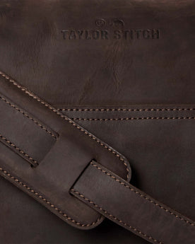 material shot of the adjustable strap on The Weekender Duffle Bag in Espresso, Accessories by Taylor Stitch