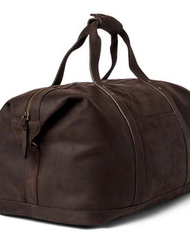 flatlay of The Weekender Duffle Bag in Espresso, shown in diagonal view, Accessories by Taylor Stitch