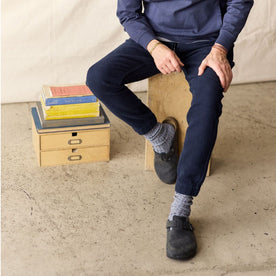 fit model with his hand in his pocket of The Apres Pant in Navy Sashiko