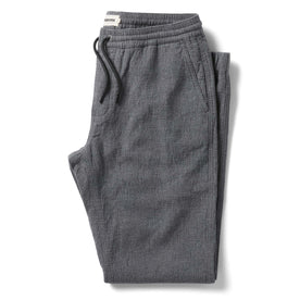 flatlay of The Apres Pant in Heather Grey Double Cloth folded