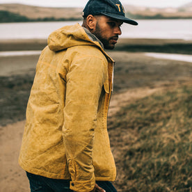 our fit model wearing The Winslow Parka in Mustard Waxed Canvas