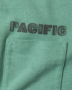 material shot of chest pocket with "pacific" text , Knits by Taylor Stitch